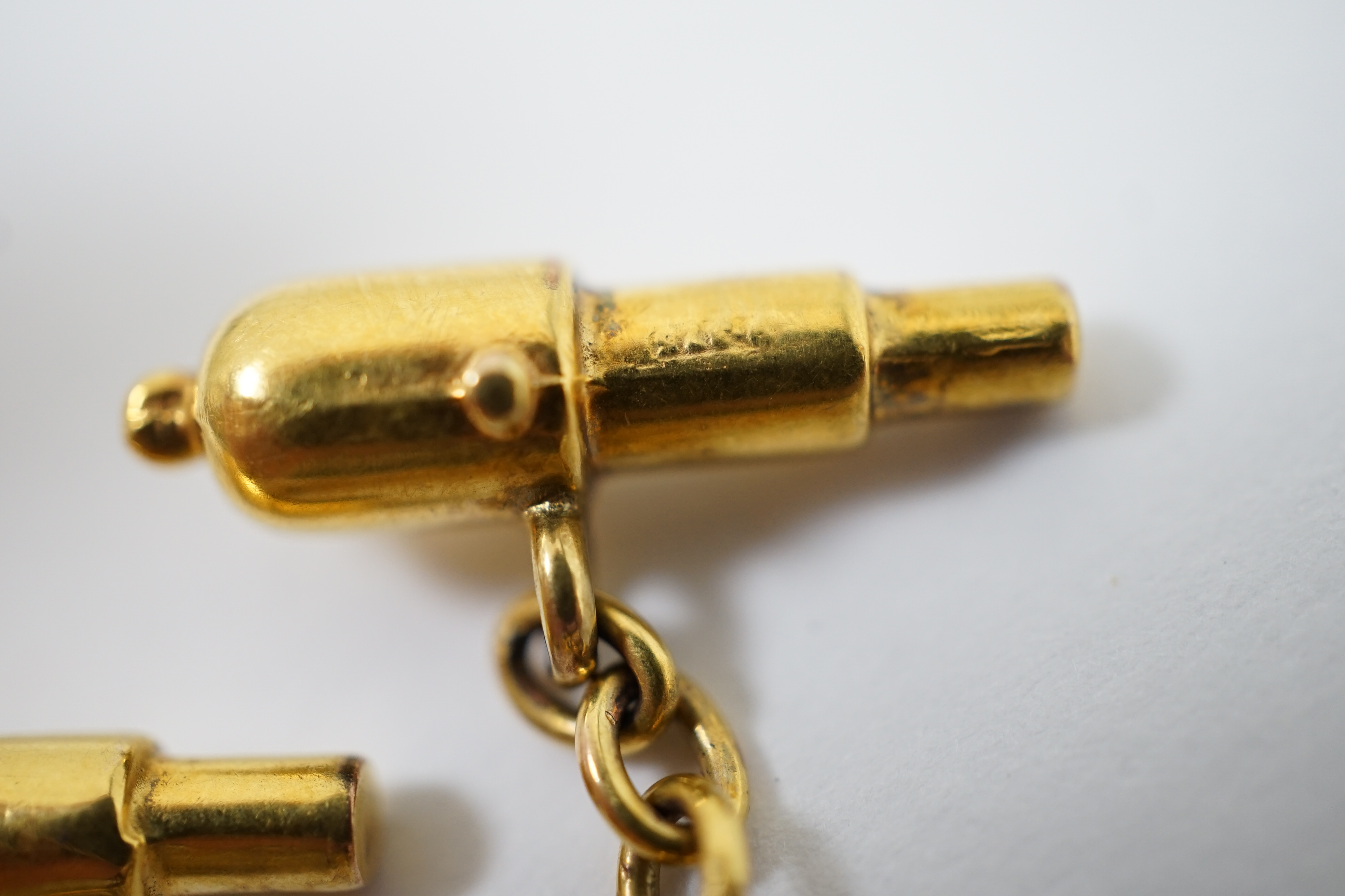 A pair of 9ct gold novelty naval theme 'rope and cannon' cufflinks